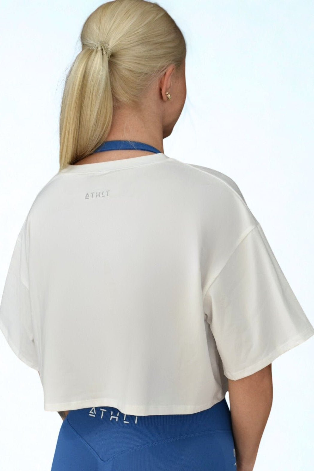 Dam vid T-shirt oversize | Croppad tränings-T-shirts med kort ärm - TRÄNING & PERFORMANCE BUTIKEN